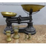 A set of scales with weights **PLEASE NOTE THIS LOT IS NOT ELIGIBLE FOR POSTING AND PACKING**