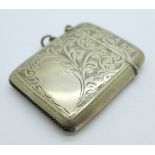 A silver vesta case