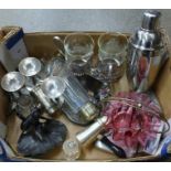 A cocktail shaker, hip flasks, etc.