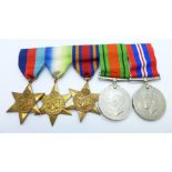 Five medals, four WWII and a replacement or copy Burma Star