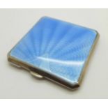 A silver and blue enamel compact with mirror and powder puff, by Walker & Hall