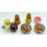 Five marbles including Victorian, two small amber glass scent bottles and three paperweights