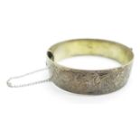 A silver bangle, 60g