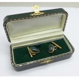 A pair of Edwardian 9ct gold and cabochon bloodstone cufflinks, total weight 6.6g