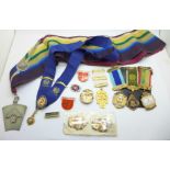 A collection of lodge badges, etc.