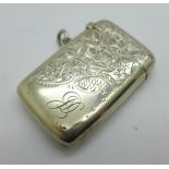 A silver vesta case