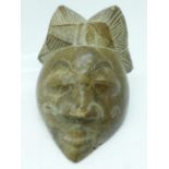 A West African carved soapstone bust, signed R. Wright to the base, a/f, width 6.5cm