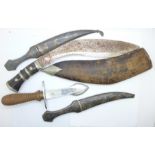 A Spanish bull fighting dagger, an Indian kukri and two North African white metal daggers