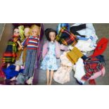 Four Sindy dolls and additional outfits