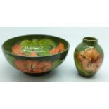 A Moorcroft bowl, diameter 16cm, and a vase, height 9.5cm, in the Coral Hisbiscus pattern on green