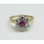 An 18ct gold, ruby and diamond cluster ring, 3.8g, O