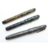 Three fountain pens; Parker Victory with 14ct gold nib, a French Unic with 18ct gold nib and a