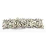 A sterling silver Arts and Crafts bracelet, with extra link, 28g