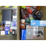 A box of mixed camera equipment, a Polaroid Land camera, Ilford camera, light meter, View-Master,