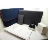 Concorde related items; two folders, blank certificate, stationery, a pen and a candle snuffer gift,