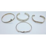 Four silver bangles, 57g