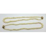 Two strings of Langer Austrian designer pearls with silver gilt magnetic clasps