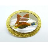 A Mizpah brooch with intaglio cut mallard in flight, the gilt metal mount decorated with thistles,