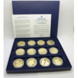 A set of twelve Queen Elizabeth II commemorative coins