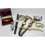 A collection of wristwatches including Roamer, Timex, Casio and Sekonda, an Ingersoll pocket watch