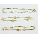 Three pearl set bracelets, one 18ct gold, one 9ct gold and one unmarked