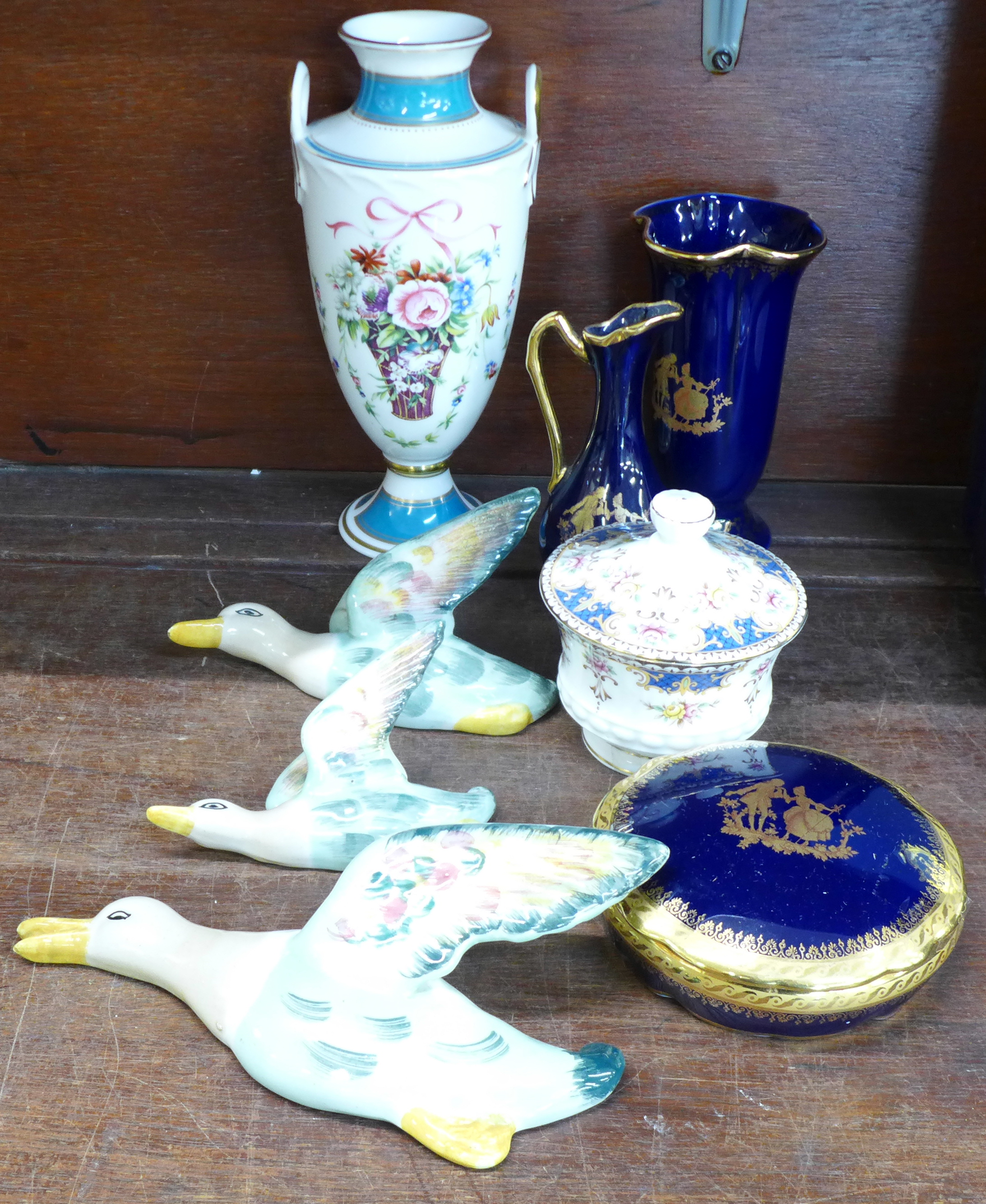 A Minton Rose basket vase, number 2376, a Queen's Kenilworth sugar pot and cover, three items of