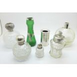 Six silver mounted bottles, et., and a silver pot, lacking tops and stoppers