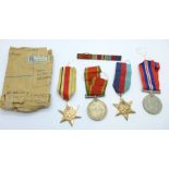 Four WWII medals including Africa Service Medal to 11833 to A. Macleod with original envelope