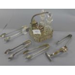 Four pairs of plated sugar bows and a plated cruet set, etc.
