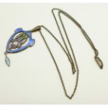 A sterling silver and enamel Art Nouveau pendant and chain, no makers mark, height without loop 42mm