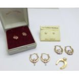 A pair of 9ct gold earrings, three other pairs of earrings and a hallmarked 9ct gold horseshoe charm