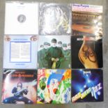 A collection of LP records including Iron Maiden, Deep Purple, Uriah Heep, Thin Lizzy, etc.