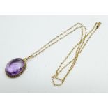 A 9ct gold set amethyst pendant chain, 5.8g, stone approximately 17mm x 14mm