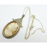 A silver and marcasite set cameo pendant and chain