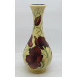 A Moorcroft vase in the Chocolate Cosmos design, shape no. 80/6 designed by Rachel Bishop, 15cm