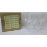 A set of six lead crystal wine glasses, signed Harrods, boxed