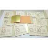 Thirteen George M. Whiley Ltd. gold leaf booklets, with box