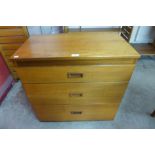 A teak tallboy and chest of drawers