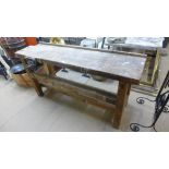 A pine workbench with vice