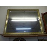 A gilt framed mirror