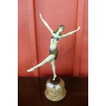 An Art Deco style bronze figure of a female dancer on a marble base