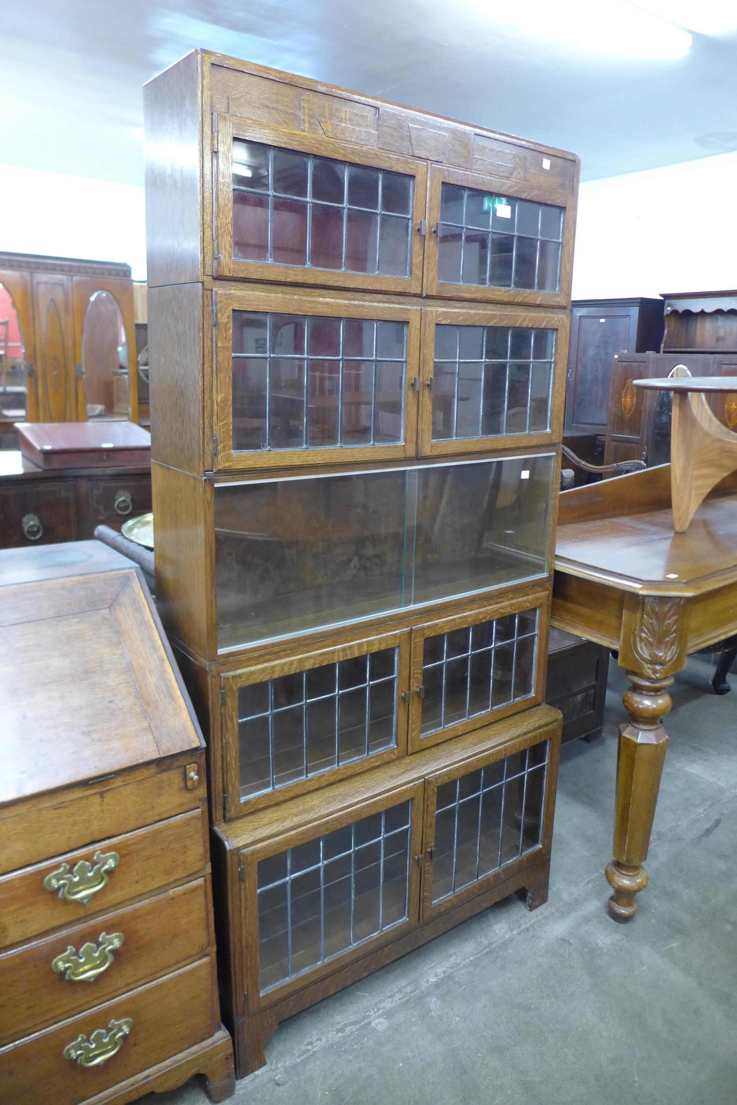 A Minty oak sectional stacking five tier bookcase