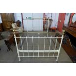 A Victorian brass and steel double bed