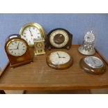 Five quartz clocks, an anniversary clock and an oak framed barometer