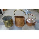 A copper kettle, log bucket and a brass log bucket