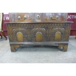 A carved oak blanket chest