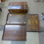 A Victorian rosewood and brass writing box and three trays