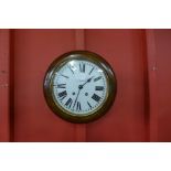 A Victorian mahogany circular wall clock