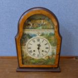 A burr walnut mantel clock