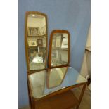Two teak framed mirrors and one other